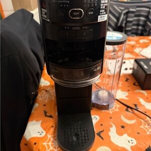 Used Ninja Soda stream, extra CO2, 22 Flavors and Flavor Holder